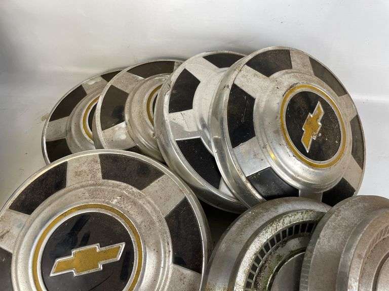 Lot of 7 Chevrolet Hubcaps