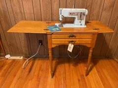 Singer Sewing Machine with Wooden Cabinet and Manual
