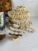 Assorted Collectibles: Floral Tray, Souvenir Scarves, Seashell Hanger, and More