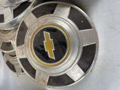 Lot of 7 Chevrolet Hubcaps
