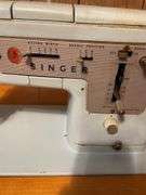 Singer Sewing Machine with Wooden Cabinet and Manual