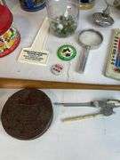 Collection of Advertising Tins, Bottles, Bottle Openers, and Collectibles