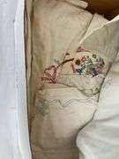Box of Embroidered Dollies and Table Runners