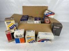 Assorted Fuel and Oil Filters: NAPA, STP, FRAM, and More