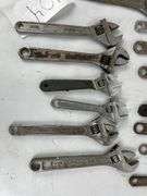 Adjustable wrenches