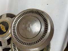 Lot of 7 Chevrolet Hubcaps