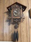Carved Wood Cuckoo Clock with Pine Cone Weights