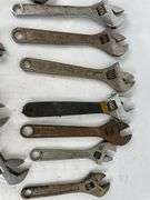 Adjustable wrenches