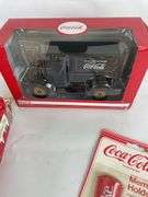 Coca-Cola Collectibles: Playing Cards, Memo Holders, and 1917 Ford Model T Diecast Car