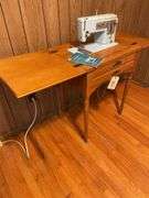 Singer Sewing Machine with Wooden Cabinet and Manual
