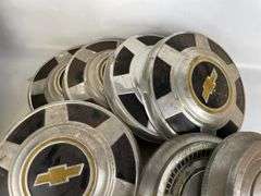 Lot of 7 Chevrolet Hubcaps