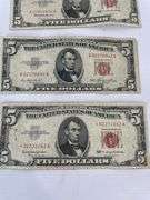Three $5 Red Seal United States Notes