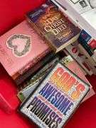 Collection of Books in Red Tote