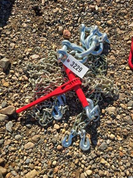 (2) 5/16 - 20' chains w/hooks G70 and (4) 1" Clevis and 1 ratchet binder image