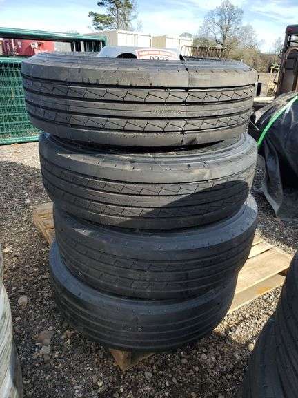 Set of 4 trailquest ST235/80R 16- 14 ply on 8 hole budwheels image