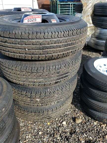 Set of 4 good ride ST235/80R16 - 10 ply on 8 hole black bud wheels image