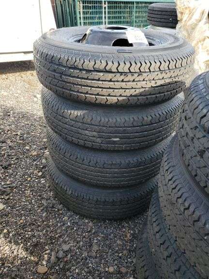 Set of 4 good ride ST235/80R16 - 10 ply on 8 hole black bud wheels image