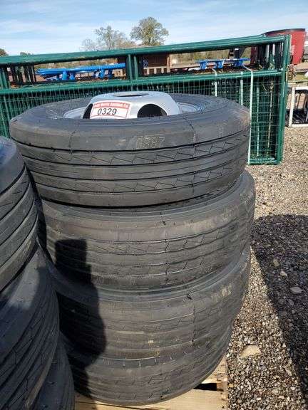 Set of 4 trailquest ST235/80R 16- 14 ply on 8 hole budwheels image