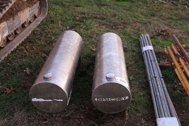 2 small stainless steel diesel tanks image