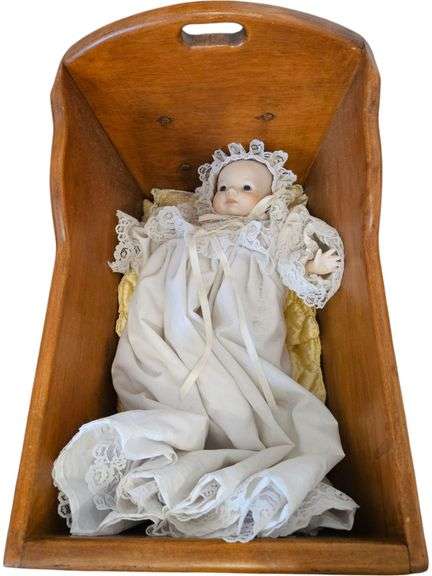 Vintage Wooden Doll Cradle with Porcelain Baby Doll image