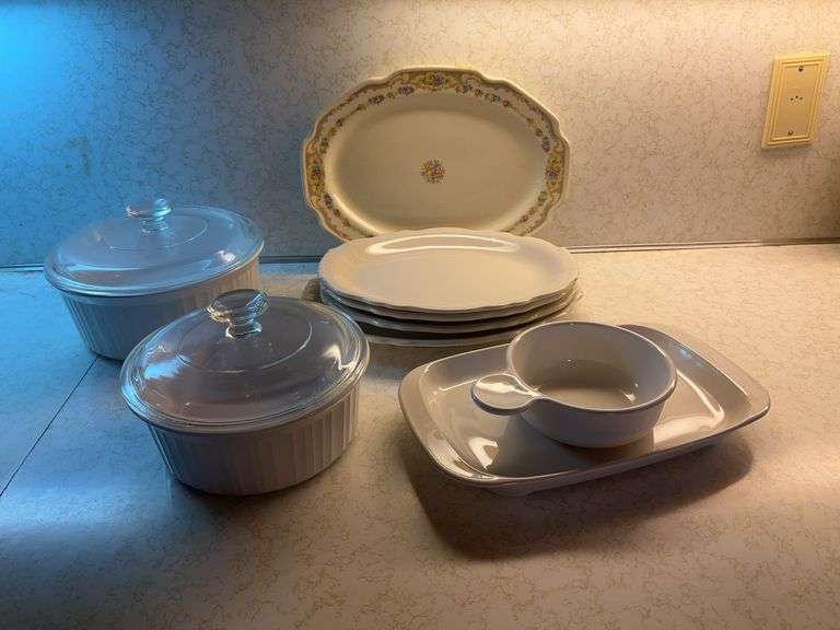 white dinner plates and bowls image