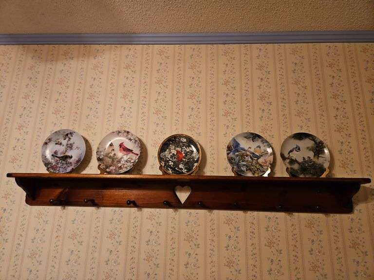 Coat shelf and decorative plates image