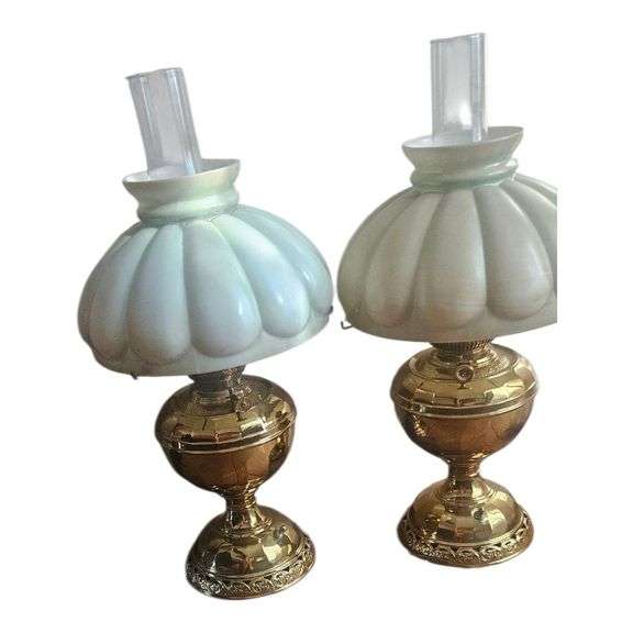Pair of Lighted Brass Lamps with Pale Green Shades image
