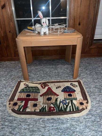 small table, books, and rug image