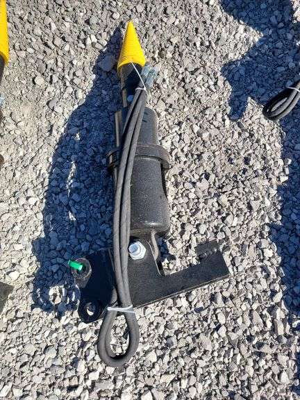 Mini excavator hydraulic wood drill. image