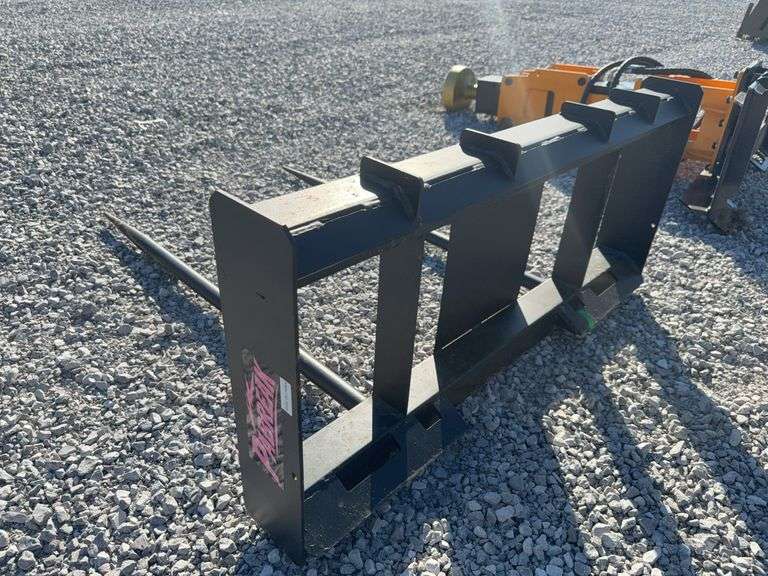 Skid steer dual prong hay spear image