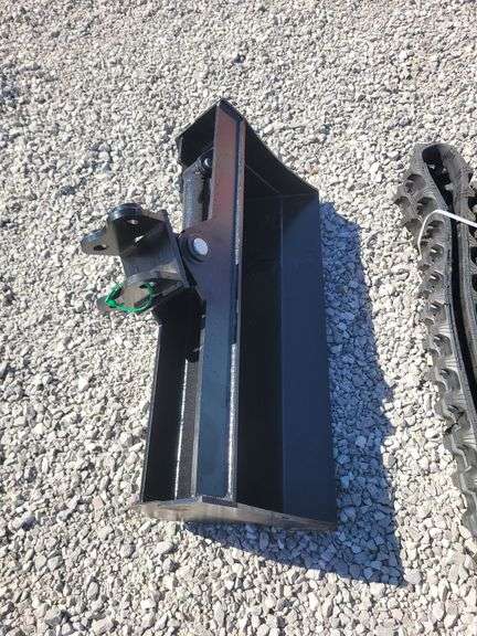 Tilting mini excavator bucket. 32" wide. image