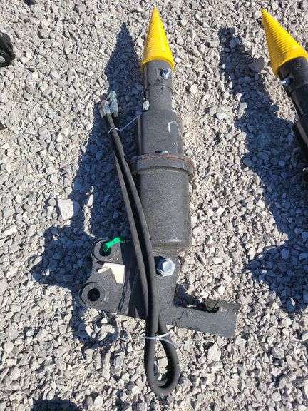 Mini excavator hydraulic wood drill. image