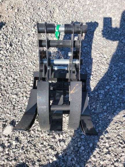 Mini excavator grapple. image