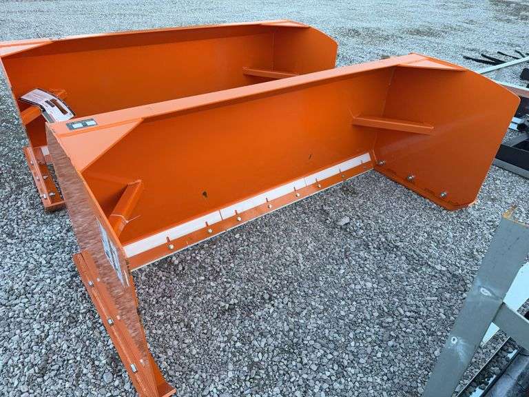 Wolverine skid steer snow pusher image