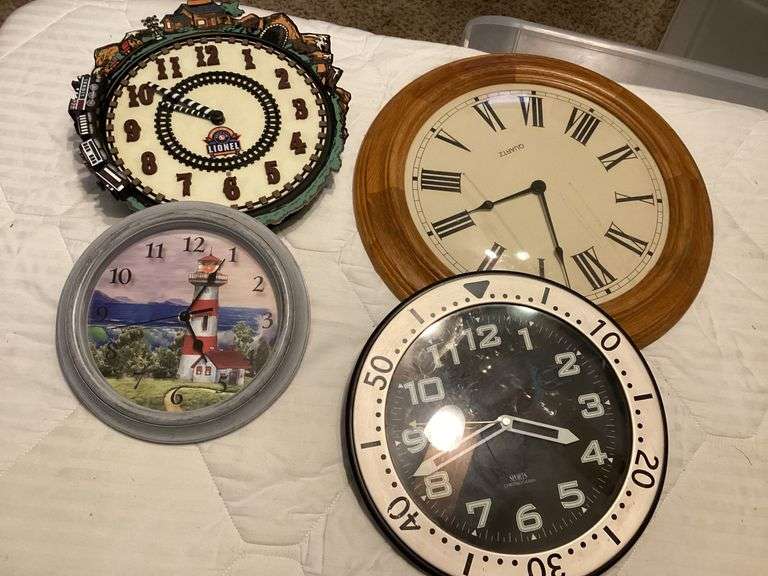 Assorted Wall Clocks - Lionel Train, Lighthouse and More - Lot of 4 image