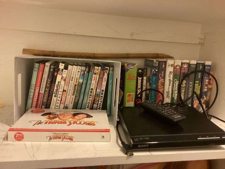 DVDs, VHS Tapes, Game, and Sony DVD Player image