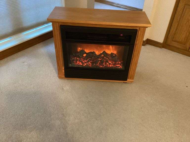 Electric Fireplace in Wood Cabinet image