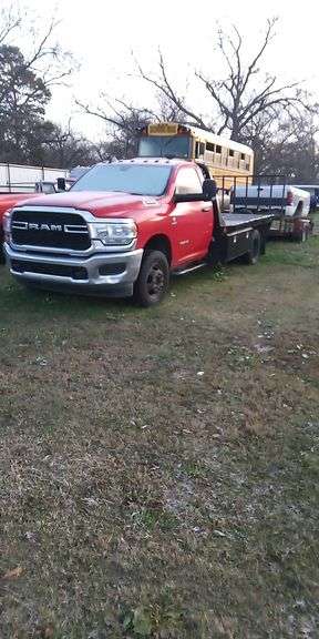 Red Ram 3500 Flatbed Truck with Trailer Hitch image