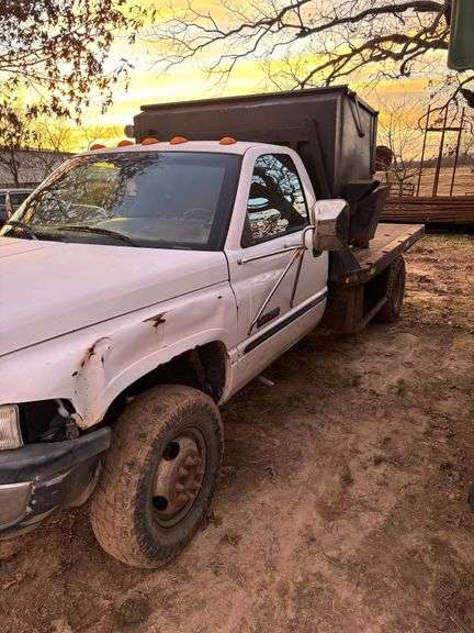 Dodge Ram 3500 Flatbed Truck with 3C feeder image