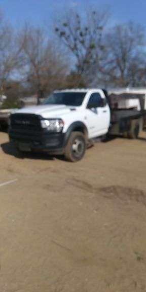 White Dodge Ram 5500 Flatbed Truck image