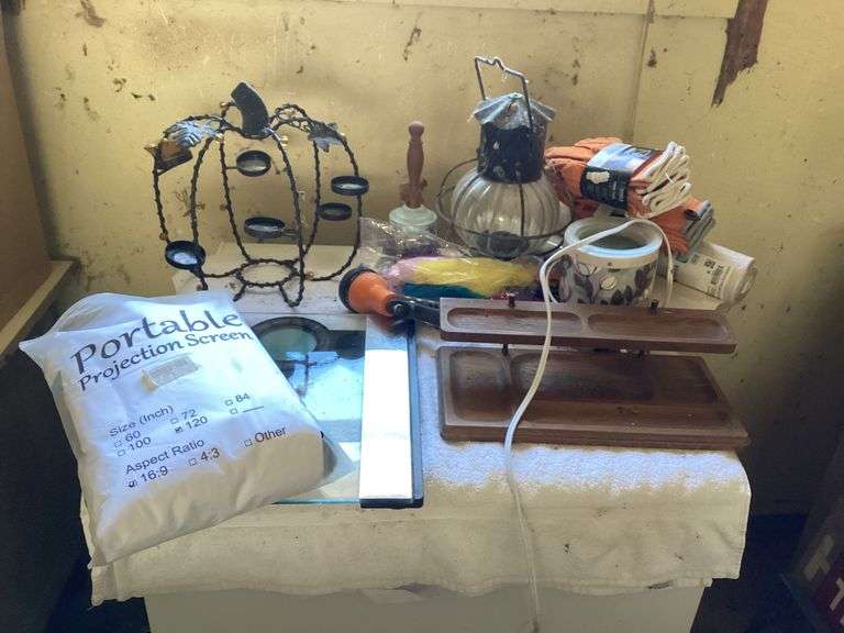 Projection Screen, Candle Holder, Garden Hose, and More image