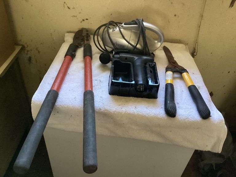 Lawn and Garden Tool Assortment: Loppers, Shears, Massager, and Handheld Vacuum image
