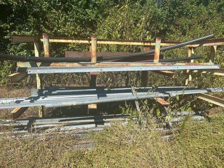 Metal Rack with Contents - Galvanized Angle Iron in Various Lengths & Sizes, & Galvanized Pipe (Flat with Holes on Ends) image