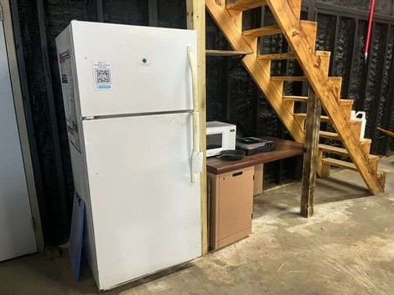 Refrigerator, Microwave, Desk, Coleman Burner, Cast Iron Pan image