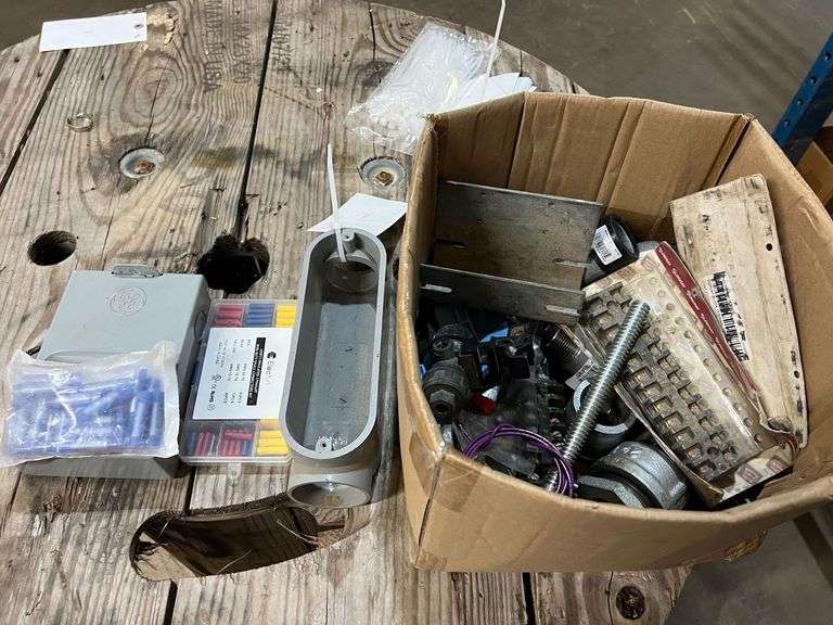 Assortment of Electrical Parts and Pipe Fittings image