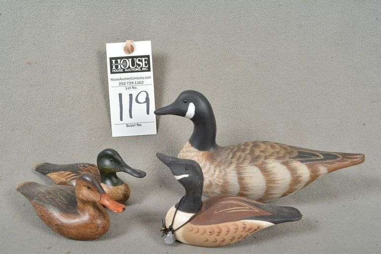 One Canada Goose - one fourth size by Bernie & Gail Corwin and three miniature decoys by Joseph B. Lee, all signed by the maker image