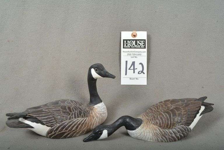 Two Canada Geese, one sentry head, one feeder head, by Dick Cook, dated Feb. 2006, signed by the maker image