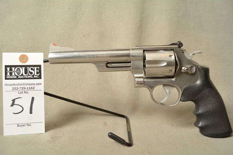 SMITH & WESSON Model 629 Stainless Handgun, cal. .44 MAG, 6" barrel, HOGUE rubber grips, red ramp front sight, white outline rear, very good condition, Ser #AJL3786 image