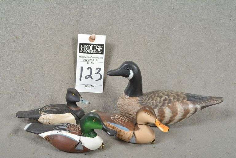 One Canada Goose - one fourth size by Bernie & Gail Corwin and three miniature decoys by Joseph B. Lee, all signed by the maker image