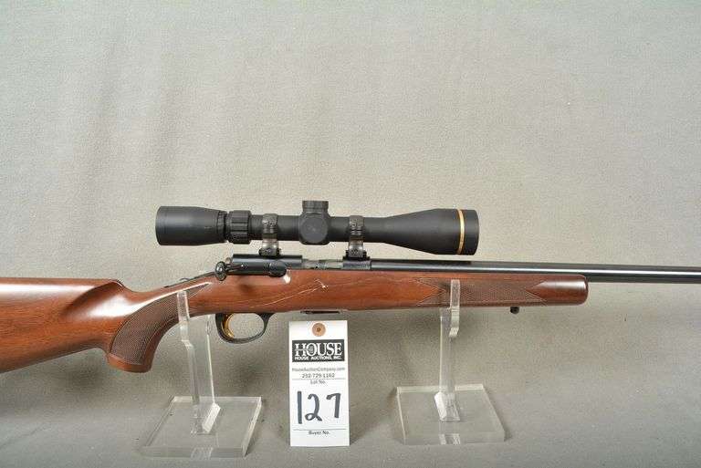 BROWNING Model T-BOLT Rifle, cal. .176 HMR, Bolt Action, 22" barrel, with LEUPOLD Scope 4-12x40, few scuffs on wood, otherwise excellent condition, Ser #05128MP253 image